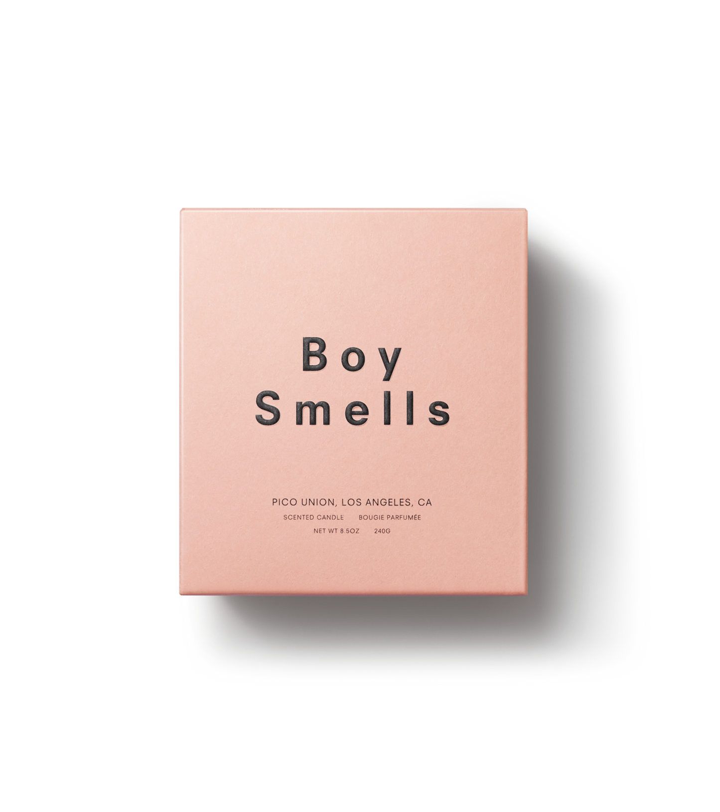 boy smells candle clean candle pink black coconut wax beeswax