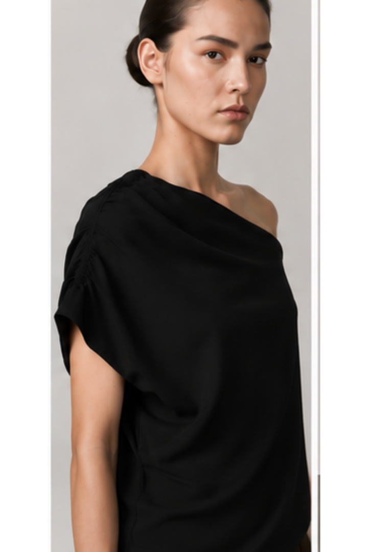 Birgitte Herskind Brenda Top in Black — one-shoulder top with a draped, asymmetric neckline.