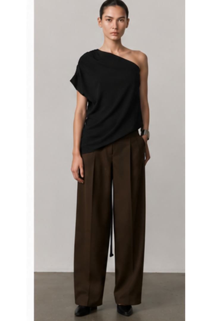 Birgitte Herskind Brenda Top in Black — gathered, draped shoulder detail with a clean hem.
